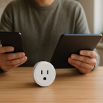 person holding tablet and phone comparing smart plug control screens